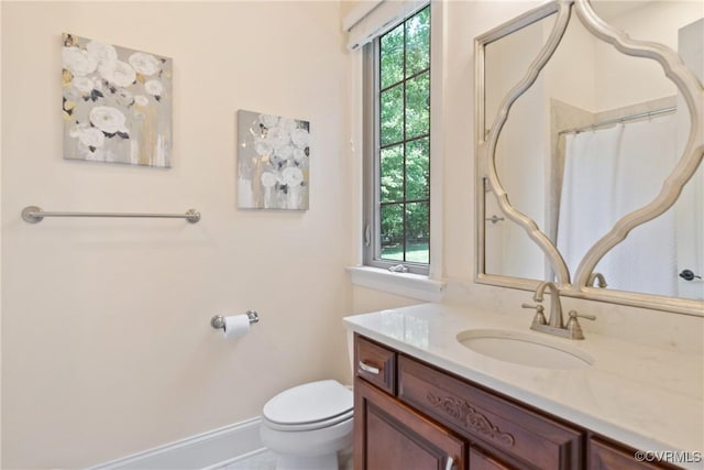 13519 Pungo Ct, Chesterfield, VA 23838 - bathroom featuring vanity, toilet, baseboards, and curtained shower