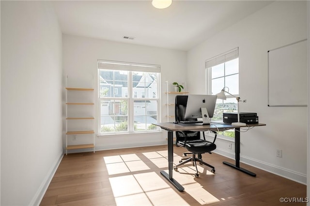 7025 Leire Dr, Chester, VA 23832 - office area featuring wood finished floors and baseboards