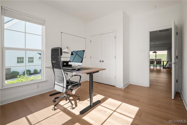 7025 Leire Dr, Chester, VA 23832 - office space with light wood-type flooring and baseboards