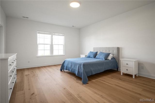 7025 Leire Dr, Chester, VA 23832 - bedroom with light wood-type flooring and baseboards