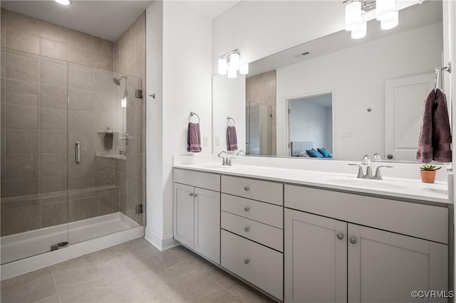 7025 Leire Dr, Chester, VA 23832 - bathroom featuring double vanity, a stall shower, tile patterned floors, and recessed lighting
