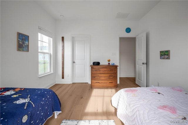 7025 Leire Dr, Chester, VA 23832 - bedroom with wood finished floors and baseboards