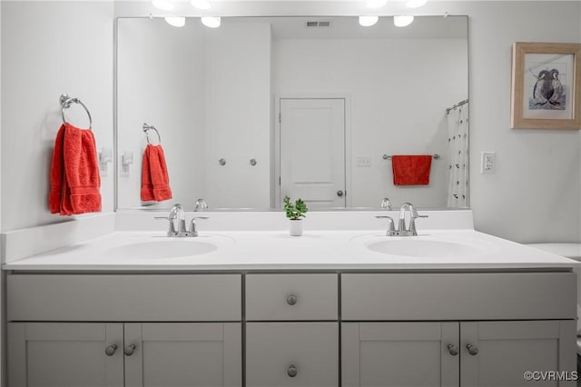 7025 Leire Dr, Chester, VA 23832 - full bathroom featuring double vanity