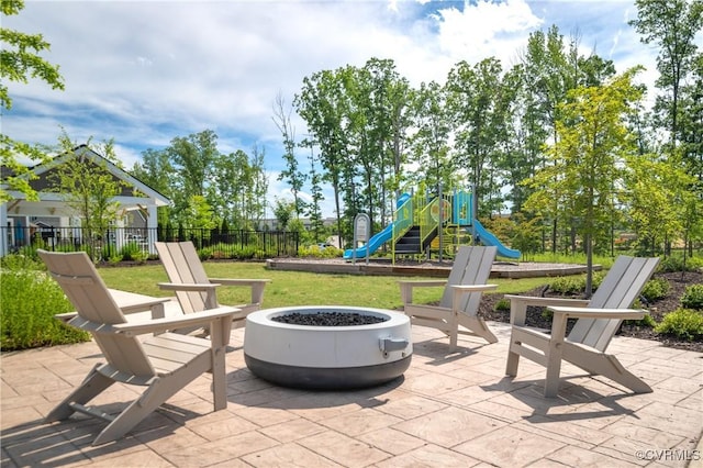 7025 Leire Dr, Chester, VA 23832 - view of patio featuring a fire pit