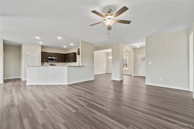 1343 Buckners Ln, Mineral, VA 23117 - unfurnished living room with a ceiling fan, baseboards, dark wood-style floors, and recessed lighting