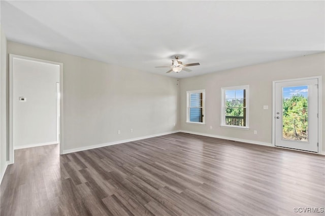 1343 Buckners Ln, Mineral, VA 23117 - unfurnished room featuring ceiling fan, dark wood finished floors, and baseboards