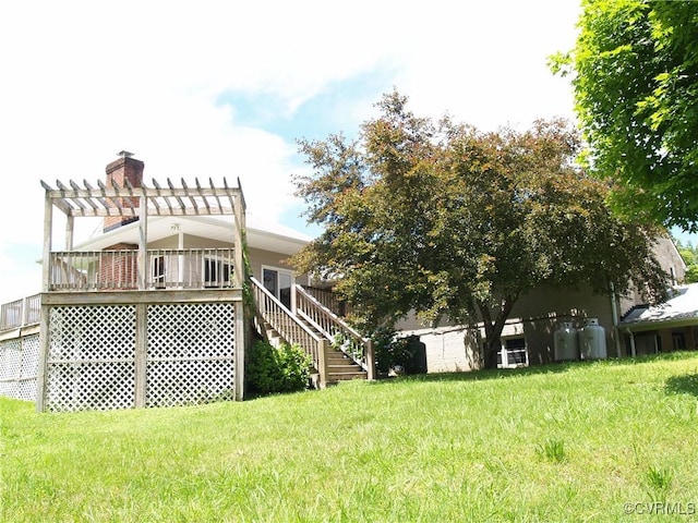 11001 Old Church Rd, New Kent, VA 23124 - rear view of house with a pergola, a lawn, and stairs