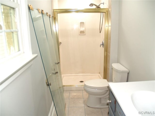 11001 Old Church Rd, New Kent, VA 23124 - full bathroom featuring vanity, a shower stall, tile patterned floors, and toilet