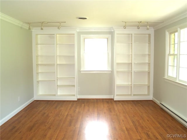 11001 Old Church Rd, New Kent, VA 23124 - spare room featuring track lighting, a baseboard radiator, ornamental molding, wood finished floors, and baseboards