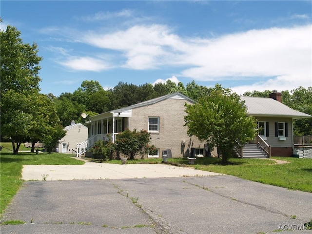 11001 Old Church Rd, New Kent, VA 23124 - view of front of property featuring a chimney and a front lawn