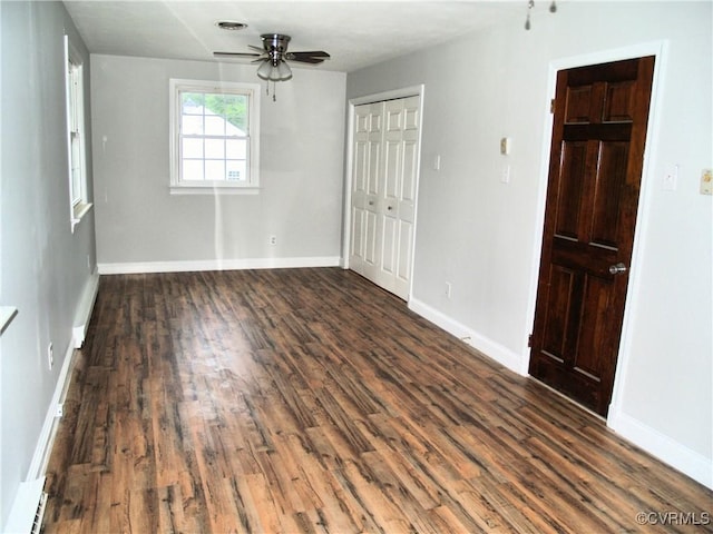 11001 Old Church Rd, New Kent, VA 23124 - unfurnished bedroom featuring wood finished floors, a closet, and a ceiling fan