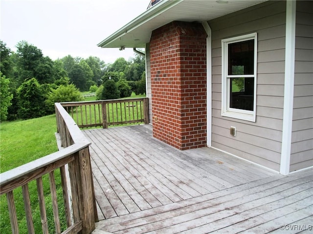 11001 Old Church Rd, New Kent, VA 23124 - wooden deck featuring a lawn