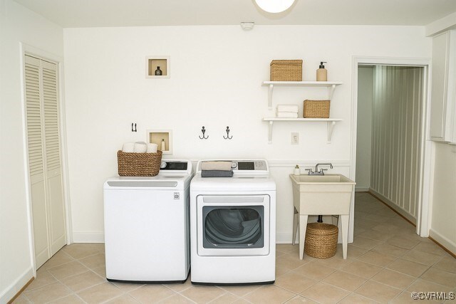 11001 Old Church Rd, New Kent, VA 23124 - washroom with washer and clothes dryer and light tile patterned floors