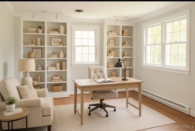 11001 Old Church Rd, New Kent, VA 23124 - office space featuring rail lighting, baseboard heating, wood finished floors, healthy amount of natural light, and crown molding