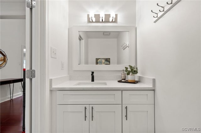 13908 Sunrise Bluff Rd, Midlothian, VA 23112 - bathroom featuring vanity and wood finished floors