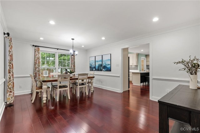 13908 Sunrise Bluff Rd, Midlothian, VA 23112 - dining space with dark wood-type flooring, a chandelier, crown molding, and recessed lighting