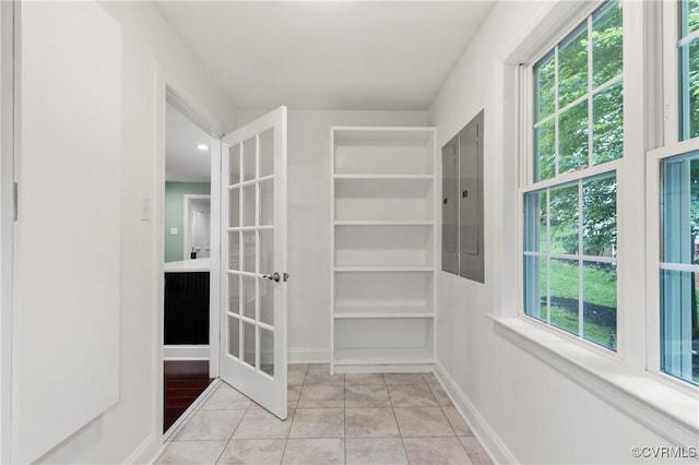 13908 Sunrise Bluff Rd, Midlothian, VA 23112 - hall featuring french doors, electric panel, and light tile patterned floors