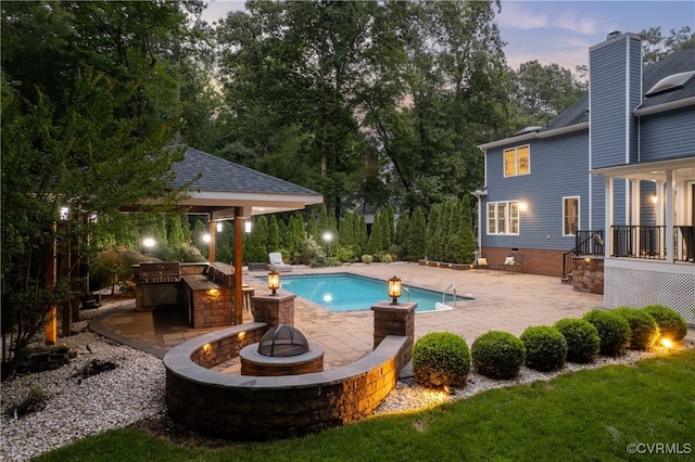 13908 Sunrise Bluff Rd, Midlothian, VA 23112 - outdoor pool with an outdoor fire pit, area for grilling, a patio, a gazebo, and view of scattered trees
