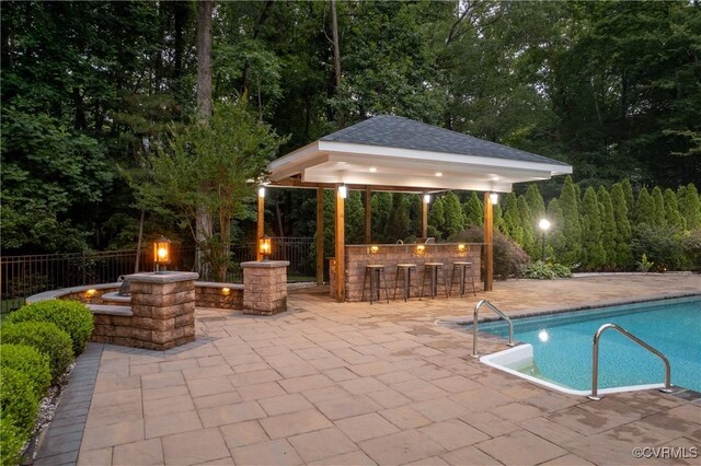 13908 Sunrise Bluff Rd, Midlothian, VA 23112 - view of swimming pool featuring a fire pit, a gazebo, and a patio area