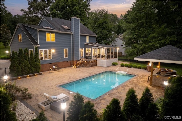 13908 Sunrise Bluff Rd, Midlothian, VA 23112 - back of property with a patio, an outdoor pool, a chimney, an outdoor fire pit, and crawl space