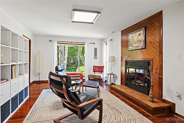 2805 Meeting Gate Ct, Chesterfield, VA 23112 - living area with a glass covered fireplace, dark wood-type flooring, and baseboards