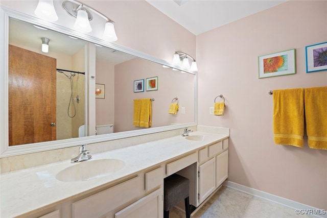 2805 Meeting Gate Ct, Chesterfield, VA 23112 - full bath featuring toilet, double vanity, a shower, baseboards, and tile patterned flooring