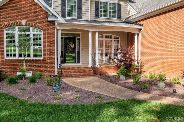 12300 Wynnstay Ln, Chesterfield, VA 23838 - entrance to property featuring brick siding, covered porch, and a shingled roof