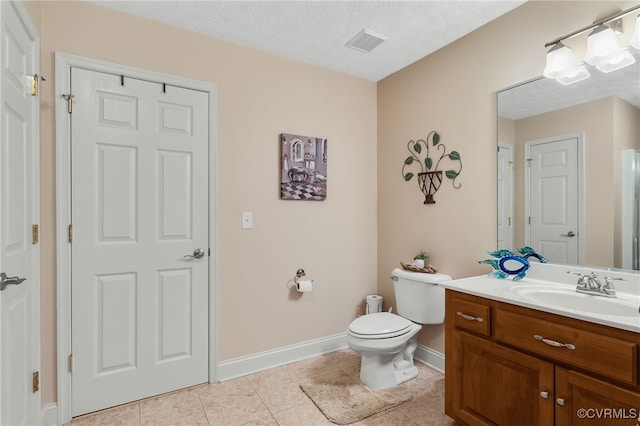 12300 Wynnstay Ln, Chesterfield, VA 23838 - bathroom with vanity, toilet, tile patterned flooring, baseboards, and a textured ceiling
