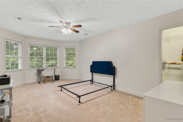 12300 Wynnstay Ln, Chesterfield, VA 23838 - living area featuring a ceiling fan, light carpet, baseboards, a textured ceiling, and a desk