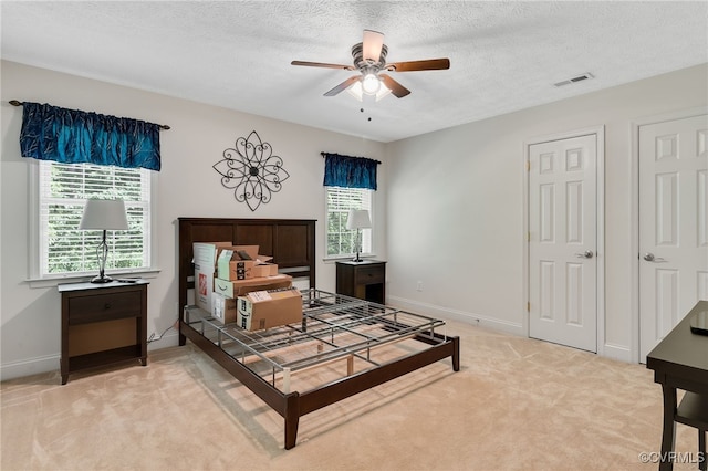 12300 Wynnstay Ln, Chesterfield, VA 23838 - bedroom featuring light carpet, baseboards, a textured ceiling, and ceiling fan