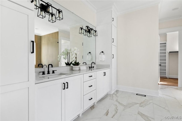 1570 Huntington Woods Trl, Powhatan, VA 23139 - full bath with double vanity, crown molding, baseboards, a spacious closet, and marble finish floors