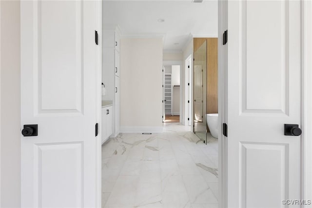 1570 Huntington Woods Trl, Powhatan, VA 23139 - corridor featuring light marble finish flooring, baseboards, and ornamental molding