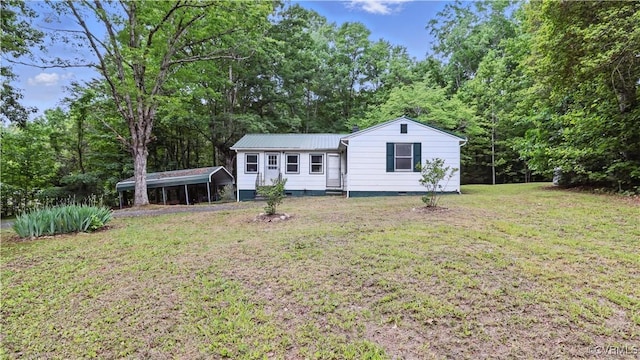 3471 High Rock Rd, Dillwyn, VA 23936 - view of front of home featuring a carport, a front lawn, crawl space, and metal roof