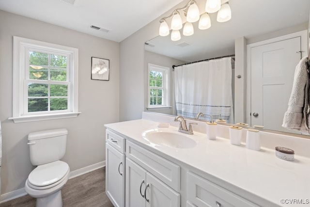 16619 Jefferson Hwy, Bumpass, VA 23024 - bathroom with vanity, wood finished floors, baseboards, and toilet