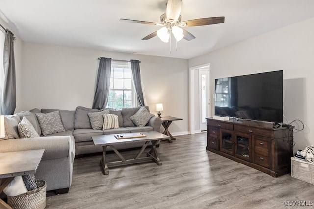 16619 Jefferson Hwy, Bumpass, VA 23024 - living area featuring light wood-style floors, ceiling fan, and baseboards