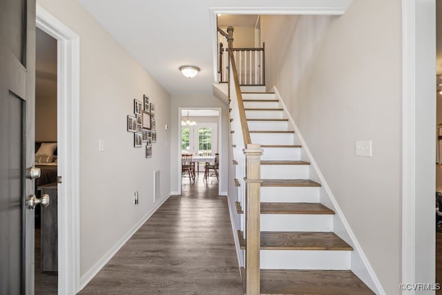 16619 Jefferson Hwy, Bumpass, VA 23024 - foyer entrance with stairway, dark wood-type flooring, a chandelier, and baseboards