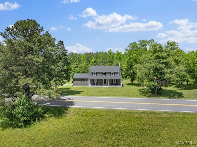 16619 Jefferson Hwy, Bumpass, VA 23024 - view of front of house featuring a wooded view and a front yard