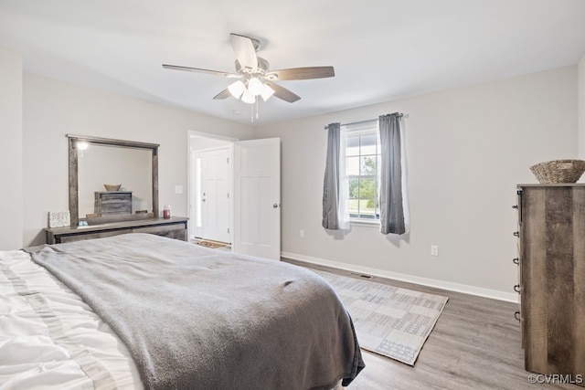 16619 Jefferson Hwy, Bumpass, VA 23024 - bedroom featuring wood finished floors, baseboards, and a ceiling fan