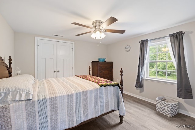 16619 Jefferson Hwy, Bumpass, VA 23024 - bedroom featuring wood finished floors, baseboards, a closet, and ceiling fan