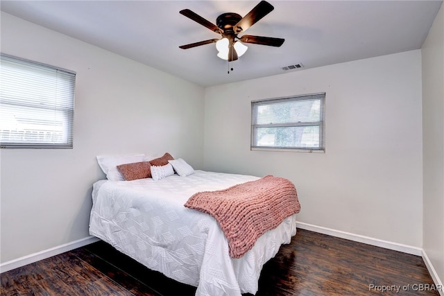 704 Athens Ave, Hampton, VA 23669 - bedroom featuring wood finished floors, baseboards, and a ceiling fan