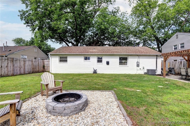 704 Athens Ave, Hampton, VA 23669 - back of house with an outdoor fire pit, central AC unit, a pergola, a patio area, and brick siding