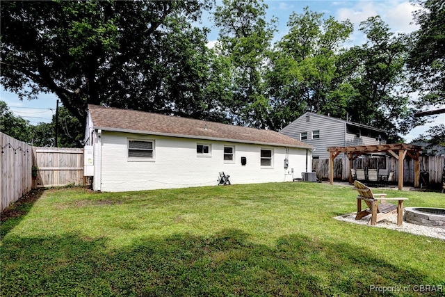 704 Athens Ave, Hampton, VA 23669 - rear view of property with an outdoor fire pit, a pergola, cooling unit, and brick siding