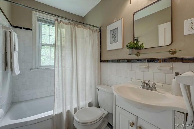 7400 Westfield Rd, Henrico, VA 23226 - bathroom with toilet, vanity, tile walls, and shower / bath combo