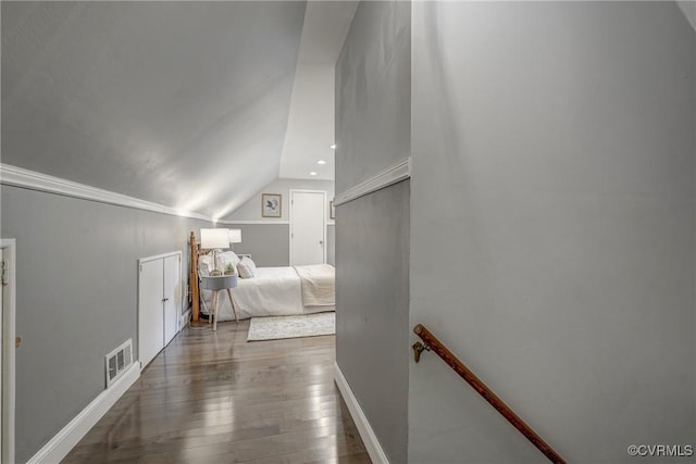 7400 Westfield Rd, Henrico, VA 23226 - bedroom featuring wood-type flooring, lofted ceiling, and baseboards