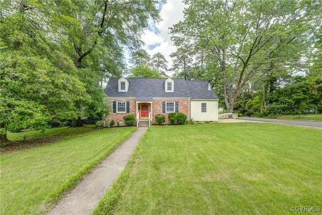 7400 Westfield Rd, Henrico, VA 23226 - cape cod-style house with a front lawn, brick siding, and crawl space