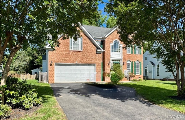 2013 Pruett Ct, Glen Allen, VA 23059 - view of front of home featuring asphalt driveway, brick siding, and an attached garage