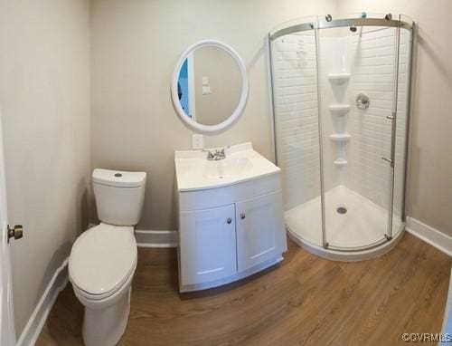 1217 Arlington St, Petersburg, VA 23803 - bathroom featuring wood finished floors, vanity, and a shower stall