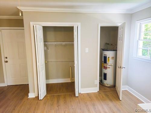1217 Arlington St, Petersburg, VA 23803 - closet featuring electric water heater
