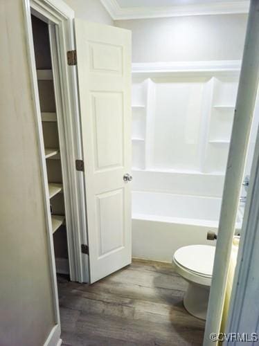 1217 Arlington St, Petersburg, VA 23803 - bathroom featuring ornamental molding, wood finished floors, and bathtub / shower combination