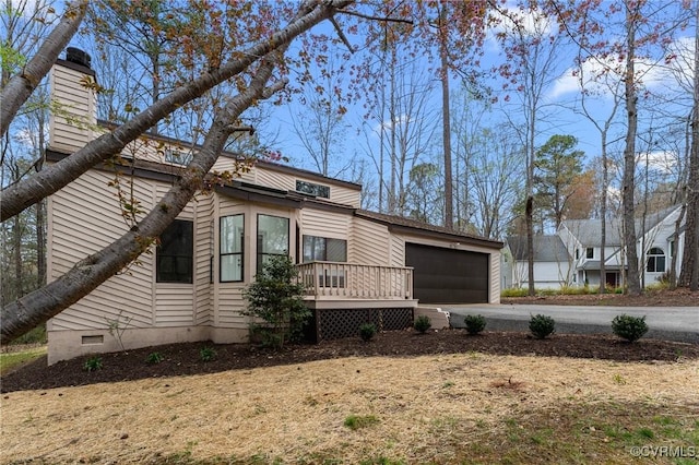 14323 Spring Gate Ct, Chesterfield, VA 23112 - view of side of home with an attached garage, driveway, and a chimney